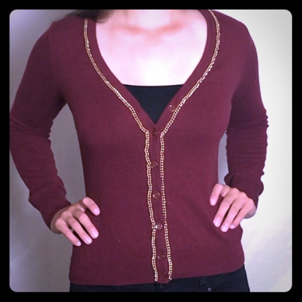 Maroon cardigan with gold chain trim
